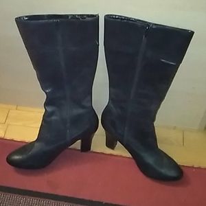 Womans  size 11, healed leather boots.  Gently wor